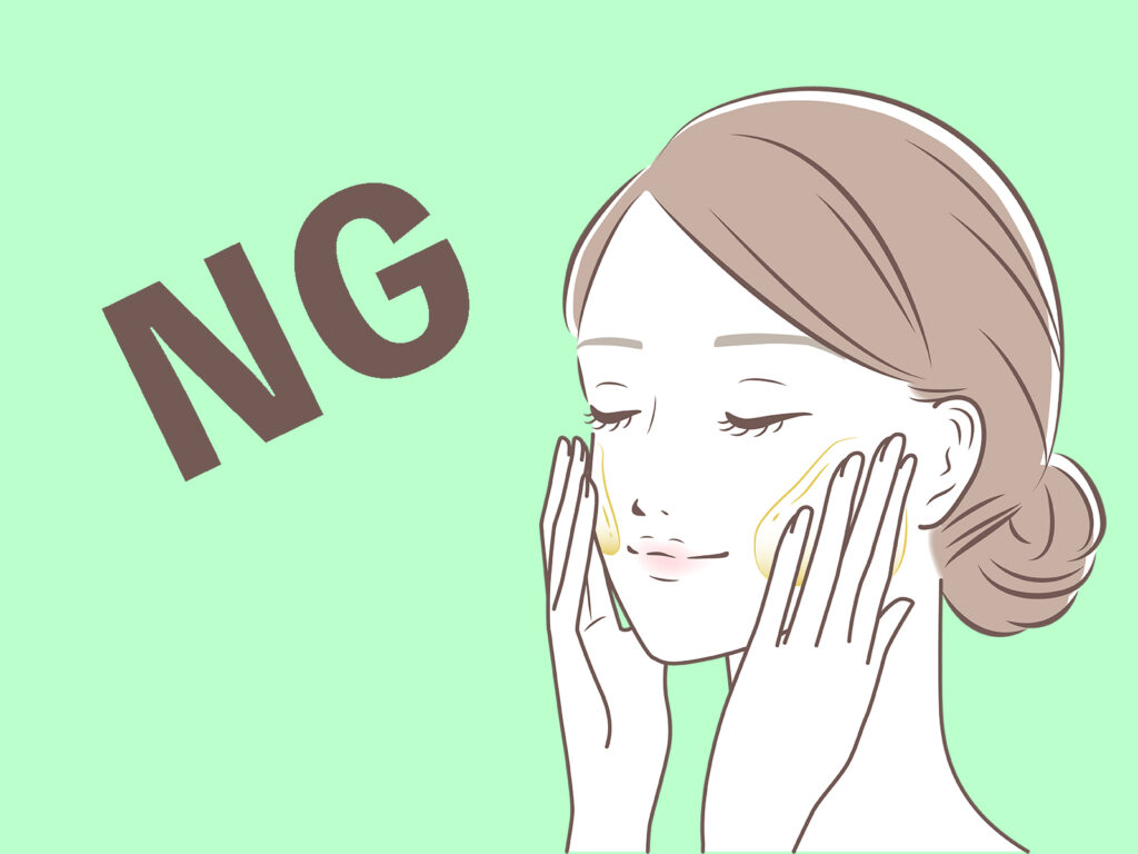 NGの文字と顔をパッティングしている女性